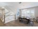 Charming dining area featuring ample natural light and a view of the staircase at 222 Willow Ave, Anna Maria, FL 34216