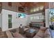 Inviting outdoor space featuring a bar, lounge, and entertainment area at 222 Willow Ave, Anna Maria, FL 34216