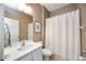 Bathroom featuring a shower with white curtain and a vanity with white counter top at 2239 Ellarose Cir, Sarasota, FL 34232