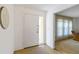Bright entryway with a neutral color palette, a closet and access to living areas at 2271 Pine View Cir, Sarasota, FL 34231