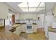 Functional kitchen with white appliances and cabinets and plenty of storage at 2271 Pine View Cir, Sarasota, FL 34231