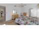Comfortable main bedroom with carpet flooring and a window with sheer curtains at 2271 Pine View Cir, Sarasota, FL 34231