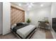 Stylish bedroom featuring a Murphy bed with decorative wood detail, a modern desk, and a sleek design at 238 Cape Harbour Loop # 104, Bradenton, FL 34212