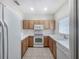 Functional kitchen with well-maintained appliances, ample cabinet space, and a clean, inviting atmosphere at 238 Cape Harbour Loop # 104, Bradenton, FL 34212