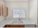 Kitchen view showcasing the sink, window, countertop space, and modern appliances at 238 Cape Harbour Loop # 104, Bradenton, FL 34212