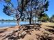 Beautiful lake view from the property with mature trees providing shade at 238 Cape Harbour Loop # 104, Bradenton, FL 34212