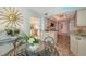 Open kitchen area with a clear view to the dining area and the ocean beyond at 2525 Gulf Of Mexico Dr # 3F, Longboat Key, FL 34228