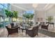 This spacious lobby area features comfortable seating, large windows, elegant decor, and natural light at 2525 Gulf Of Mexico Dr # 3F, Longboat Key, FL 34228