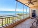 Enjoy breathtaking ocean views from this inviting screened-in balcony with tile floors and a ceiling fan at 2715 Terra Ceia Bay Blvd # 504, Palmetto, FL 34221