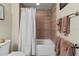 Neutral bathroom with a bathtub, a white shower curtain, and towel bars at 2715 Terra Ceia Bay Blvd # 504, Palmetto, FL 34221