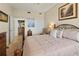 Bedroom with carpet, ceiling fan, adjacent bathroom and walk-in closet at 2715 Terra Ceia Bay Blvd # 504, Palmetto, FL 34221