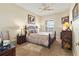 Comfortable bedroom with carpet, ceiling fan and lots of light at 2715 Terra Ceia Bay Blvd # 504, Palmetto, FL 34221