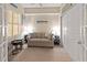 Bright bedroom with neutral walls, a comfortable sofa, and plenty of natural light at 2715 Terra Ceia Bay Blvd # 504, Palmetto, FL 34221