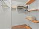 Walk-in closet with wire and wood shelving, providing ample storage space at 2715 Terra Ceia Bay Blvd # 504, Palmetto, FL 34221