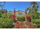 Community sign with manicured landscaping and mature palm trees at 2715 Terra Ceia Bay Blvd # 504, Palmetto, FL 34221