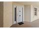Inviting front door with a decorative welcome mat and side window provides bright light at 2715 Terra Ceia Bay Blvd # 504, Palmetto, FL 34221