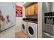 A convenient laundry area equipped with a washer and dryer at 2715 Terra Ceia Bay Blvd # 504, Palmetto, FL 34221