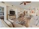 A cozy living room with comfortable seating and an entertainment center at 2715 Terra Ceia Bay Blvd # 504, Palmetto, FL 34221
