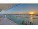 Wide balcony features panoramic water views of the bridge and waterfront at 280 Golden Gate Pt # 600, Sarasota, FL 34236