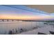 Expansive balcony offering stunning waterfront views and city bridge access for a luxury home experience at 280 Golden Gate Pt # 600, Sarasota, FL 34236