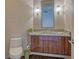 Bathroom with marble counter and wood vanity at 280 Golden Gate Pt # 600, Sarasota, FL 34236