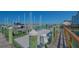 Boat lift and dock showcasing waterfront access at 280 Golden Gate Pt # 600, Sarasota, FL 34236