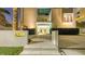 Striking condo building exterior featuring manicured landscaping and contemporary architectural design at 280 Golden Gate Pt # 600, Sarasota, FL 34236
