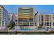 Modern high-rise building with a waterfront pool and access to a boat dock at 280 Golden Gate Pt # 600, Sarasota, FL 34236