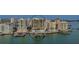 Waterfront luxury condo building with boat docks and swimming pool at 280 Golden Gate Pt # 600, Sarasota, FL 34236