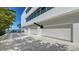 Garage with multiple bays and exterior parking area at 280 Golden Gate Pt # 600, Sarasota, FL 34236