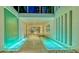 Beautiful hallway with unique water features and modern design elements at 280 Golden Gate Pt # 600, Sarasota, FL 34236