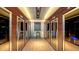 Climate-controlled wine room with individual storage lockers for residents' collections at 280 Golden Gate Pt # 600, Sarasota, FL 34236
