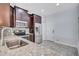 Bright kitchen featuring stainless steel appliances, granite countertops, and tile backsplash at 288 Crew Ct, Sarasota, FL 34243