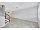 A spacious living room area offering versatile layout possibilities, tile flooring and neutral colors at 288 Crew Ct, Sarasota, FL 34243