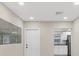 Bright living room with view to kitchen at 2947 Goodrich Ave, Sarasota, FL 34234