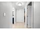 Hallway with tile flooring with access to bathroom and bedroom at 2950 Clark Rd # 113, Sarasota, FL 34231