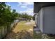 Wide view of a backyard enclosed by a chain link fence at 3505 27Th W Ave, Bradenton, FL 34205