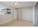 Bedroom featuring tile flooring and sliding glass doors at 3505 27Th W Ave, Bradenton, FL 34205