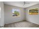 Cozy bedroom with neutral walls, carpet, and bright windows at 3505 27Th W Ave, Bradenton, FL 34205