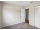 Bedroom with neutral carpeting, closet, and access to bathroom at 3505 27Th W Ave, Bradenton, FL 34205