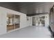 Enclosed screened patio with access to both the interior of the home and backyard area at 3505 27Th W Ave, Bradenton, FL 34205