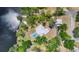 Stunning aerial view of the property showcasing the expansive grounds, private pool, and waterfront location at 4311 52Nd E St, Bradenton, FL 34208