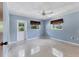 Powder blue bedroom featuring natural lighting, neutral flooring, and ample space at 4311 52Nd E St, Bradenton, FL 34208