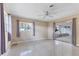 Bright bedroom with large windows and mirrored closet showcasing view to outdoor patio at 4311 52Nd E St, Bradenton, FL 34208