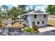 Charming two-story home with a well-maintained yard and mature landscaping at 4311 52Nd E St, Bradenton, FL 34208