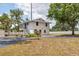 Inviting two-story home with a spacious yard, storage shed, and mature trees at 4311 52Nd E St, Bradenton, FL 34208
