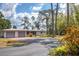 Well-maintained single-story home with an attached garage, and manicured lawn at 4311 52Nd E St, Bradenton, FL 34208