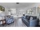 Comfortable living room seamlessly connecting to the kitchen and dining area, perfect for entertaining at 4311 52Nd E St, Bradenton, FL 34208