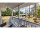 Exterior porch view featuring a large tree and home across the street at 4311 52Nd E St, Bradenton, FL 34208