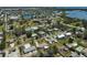 This aerial view showcases the neighborhood homes and street at 4420 101St W St, Bradenton, FL 34210